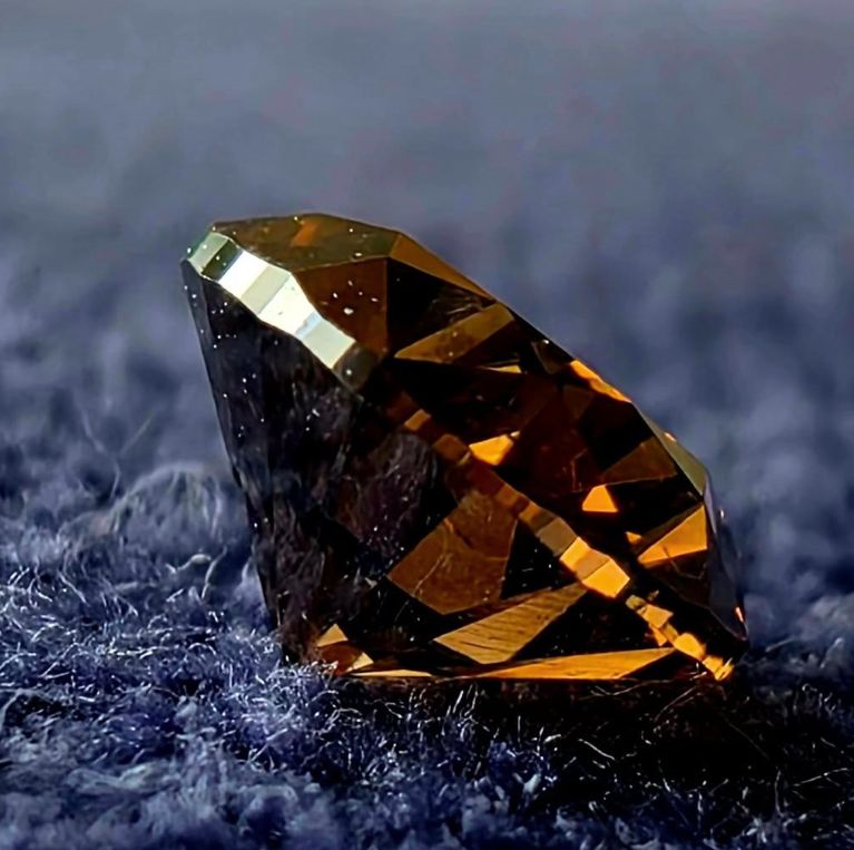 1.00 ct Natural Fancy Deep Yellowish Brown Diamond – Oval Cut – Antwerp Certified