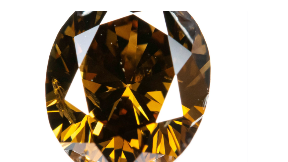1.00 ct Natural Fancy Deep Yellowish Brown Diamond – Oval Cut – Antwerp Certified